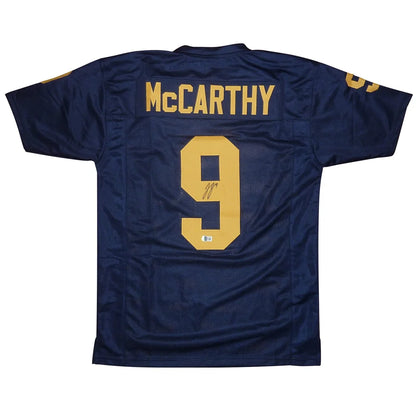 Autographed Michigan Wolverines JJ McCarthy blue jersey #9