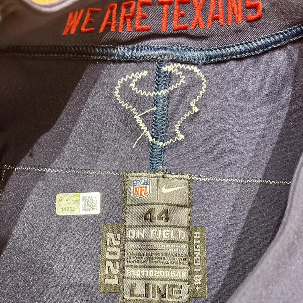 Autographed JJ Watt Houston Texans game issued jersey with red We Are Texans lettering and heart design