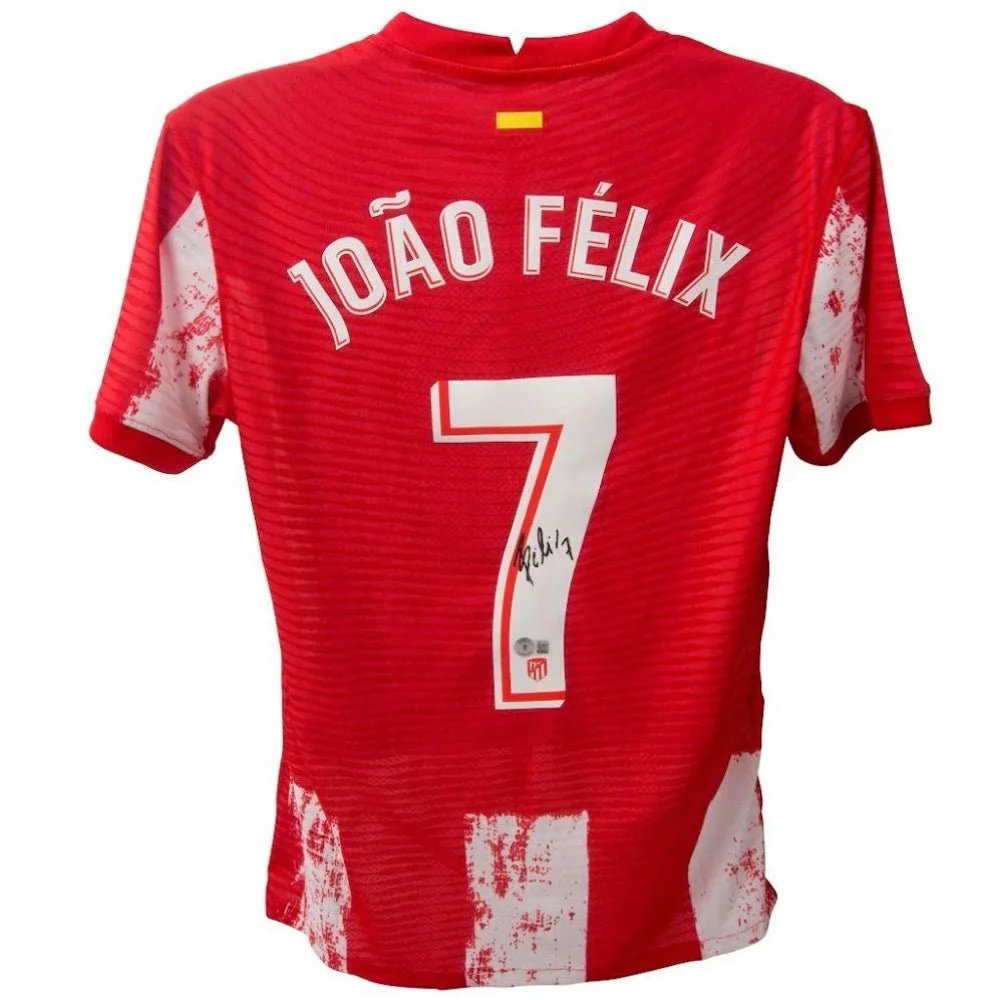 Red and white Atletico Madrid jersey with Joao Felix signed name and number 7