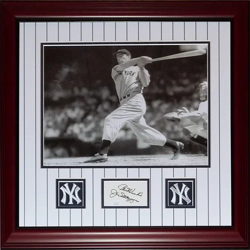 Framed 11x14 photo of Joe DiMaggio in Yankees uniform with autograph