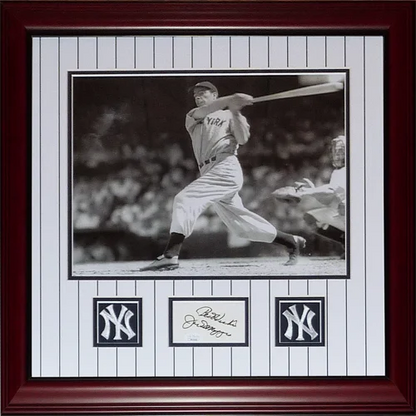 Framed 11x14 photo of Joe DiMaggio in Yankees uniform with autograph