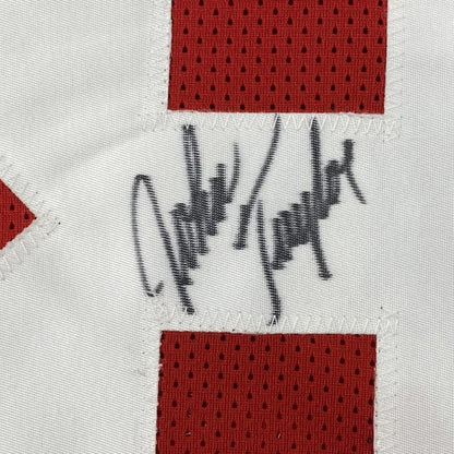 Autographed Red and White 49ers Jersey with Joe Taylor signature and action photos