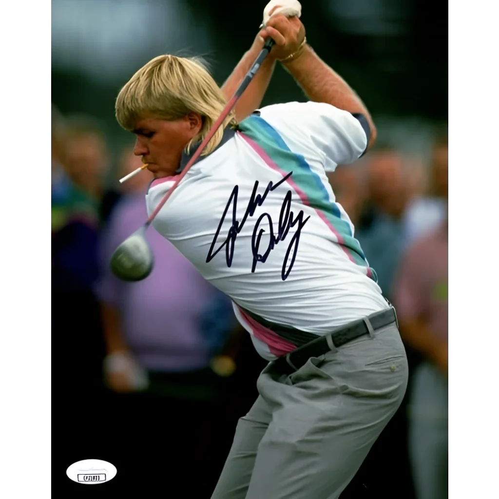 John Daly autographed golf shirt with pink teal stripes signed by player