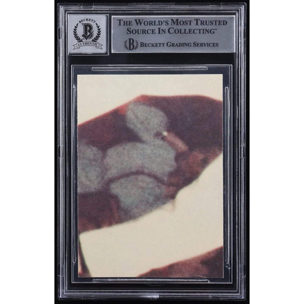 Beckett-graded John Travolta Saturday Night Fever autographed card with abstract blurry image