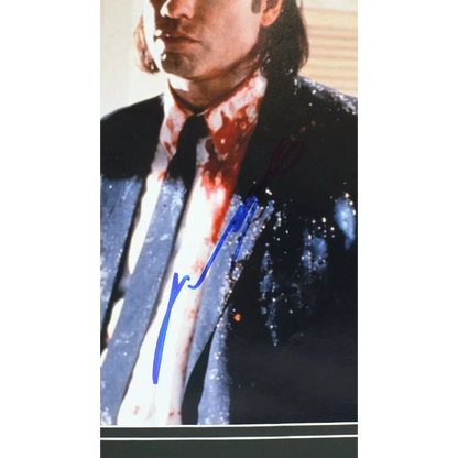 Autographed John Travolta photo in blood-stained suit from Pulp Fiction framed 16x20