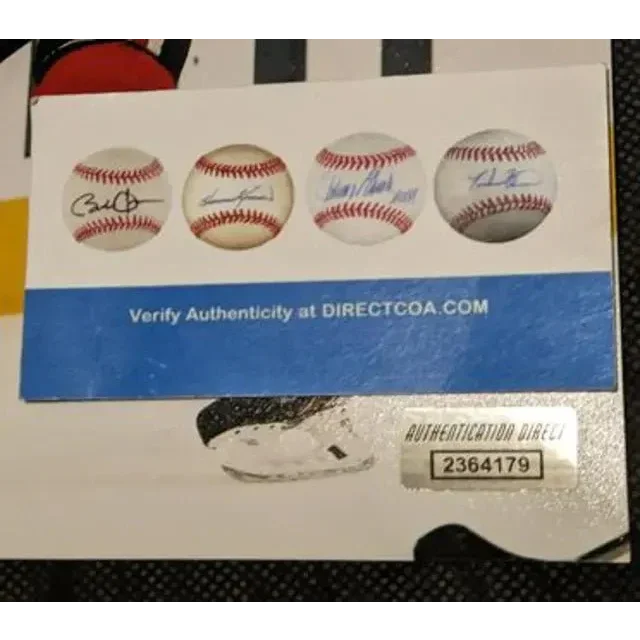 White card with blackhawks autographed baseballs and authenticity sticker for johnathan toews blackhawks