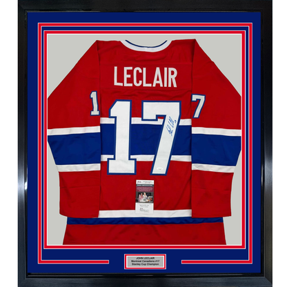 Framed Montreal Canadiens red, white, and blue hockey jersey #17 signed by John LeClair with JSA certification label visible.