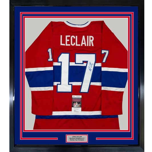 Framed Montreal Canadiens red, white, and blue hockey jersey #17 signed by John LeClair with JSA certification label visible.