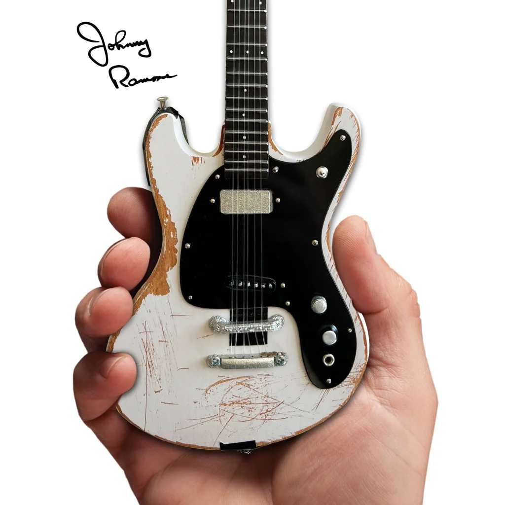 Johnny Ramone Axe Heaven mini guitar with distressed finish and adjustable A-frame stand