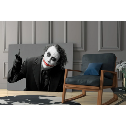 Joker canvas wall art print with black suit, white face, knife and bold red lips