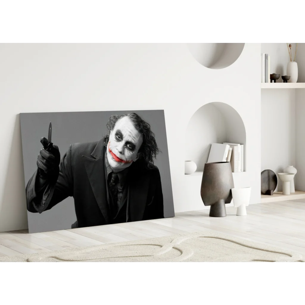 Joker canvas wall art print with knife and bold red lips in black and white