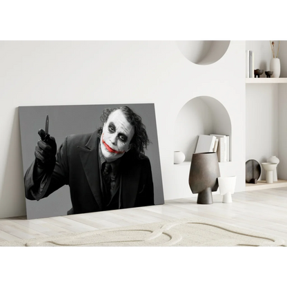 Joker canvas wall art print with knife and bold red lips in black and white