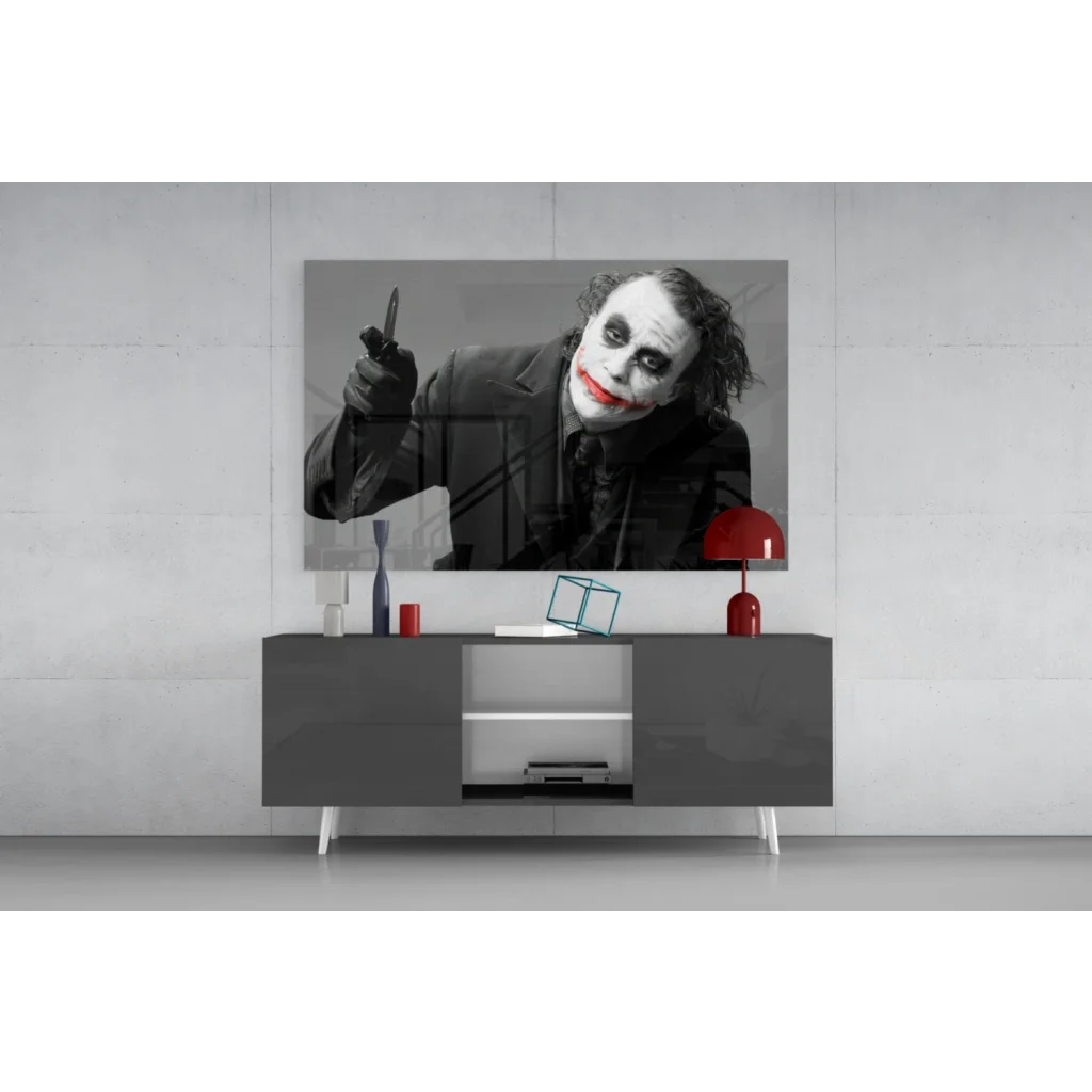 Sleek Joker canvas wall art with knife and bold red lips on 4K smart TV