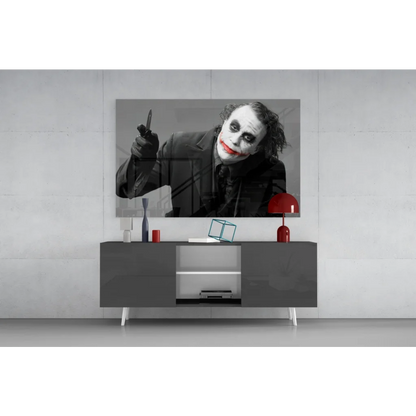 Sleek Joker canvas wall art with knife and bold red lips on 4K smart TV