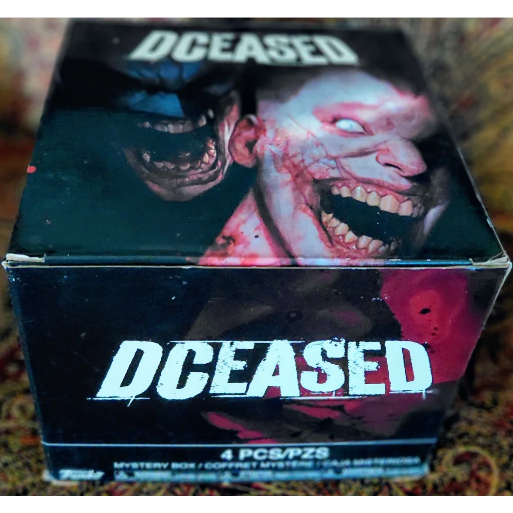 Joker Dceased mystery box with zombie toy collection and Funko Pop