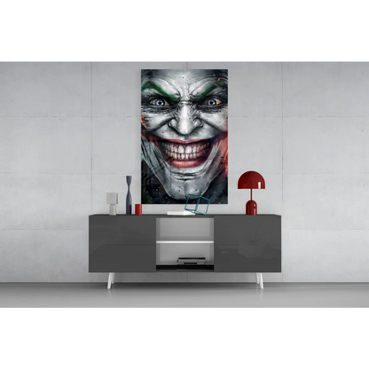 Joker face glass wall art in black-and-white with green and red accents