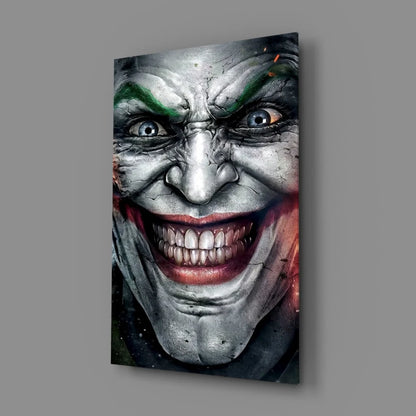 Joker face glass wall art with cracked makeup and vivid green red details