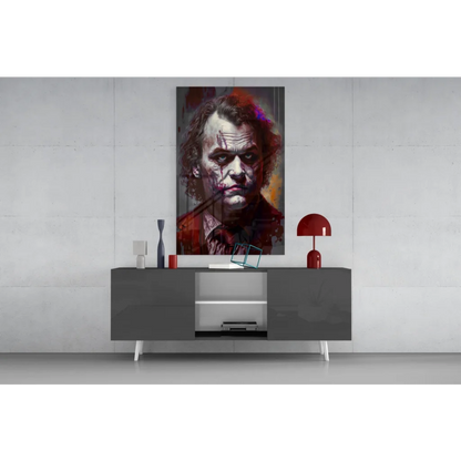 Vibrant Joker glass wall art portrait with red purple swirls