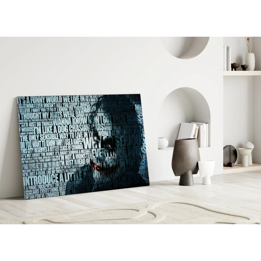 Stylized Joker face in layered white text on dark blue canvas wall art