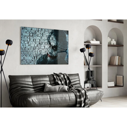 Black leather sofa with plaid blanket and Joker quote wall art