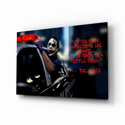 Joker in police car black canvas wall art with madness quote