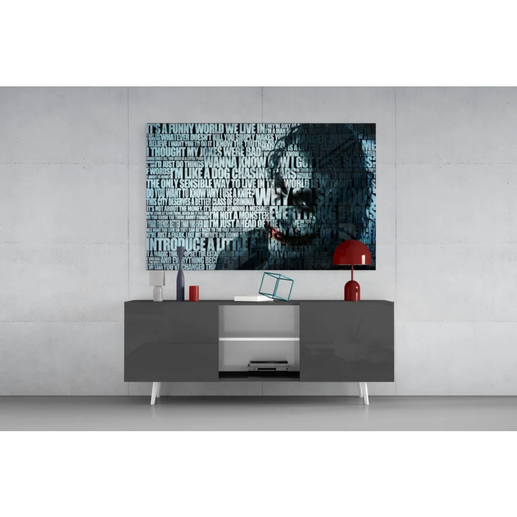 Stylized Joker quote wall art on dark blue canvas above gray console