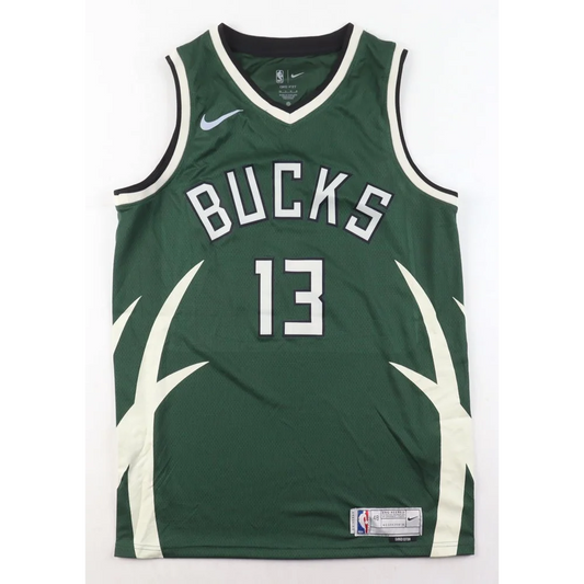 Jordan Nwora signed green Nike basketball jersey with white trim and numbers