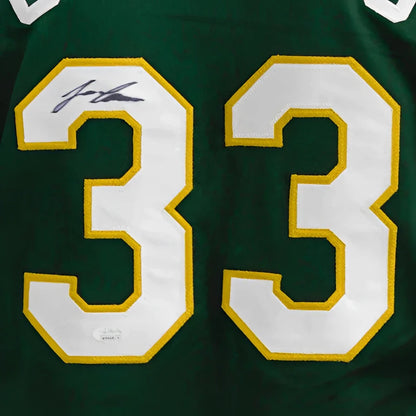 Jose Canseco autographed green custom jersey with number 33 and gold trim