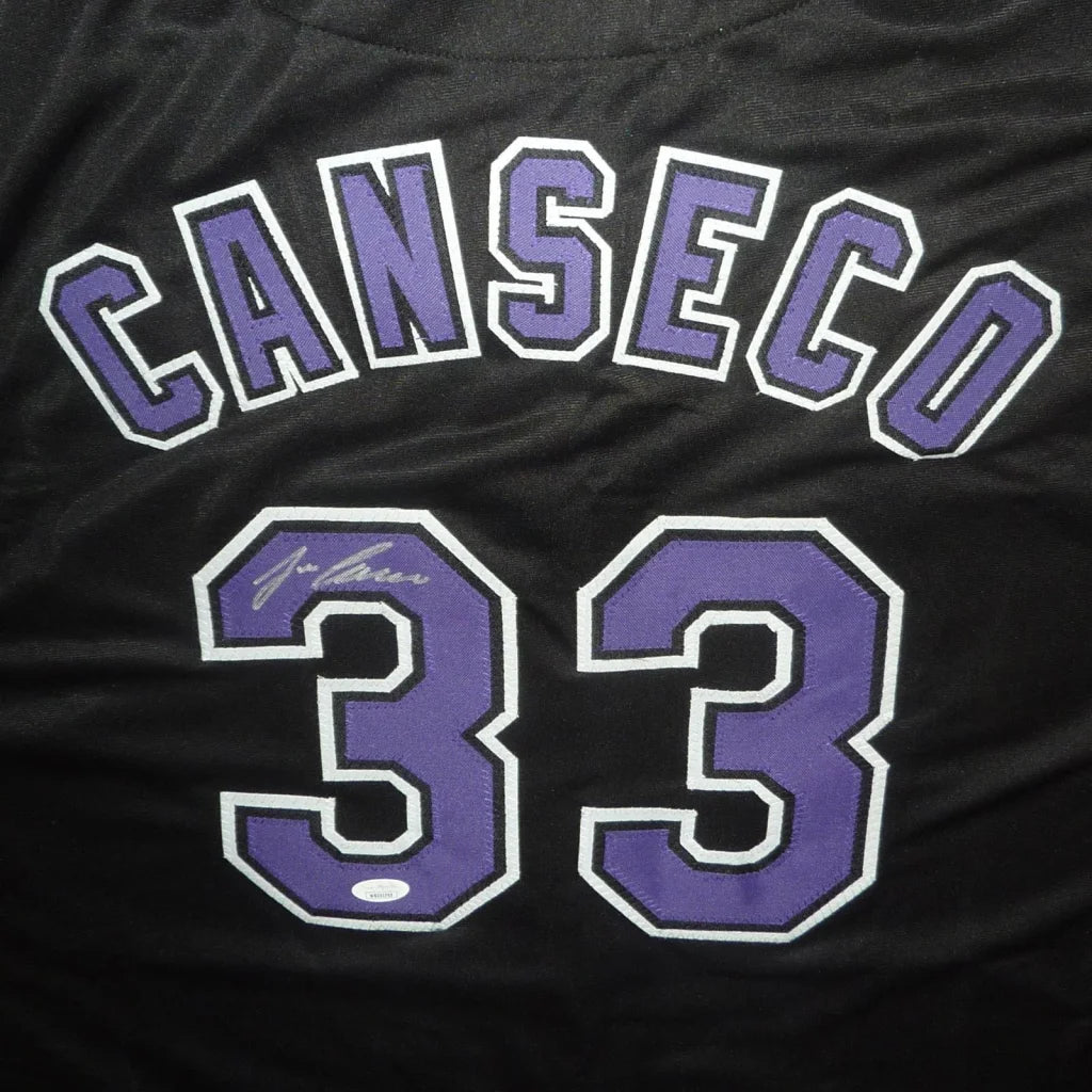 Jose Canseco autographed black custom jersey with purple lettering