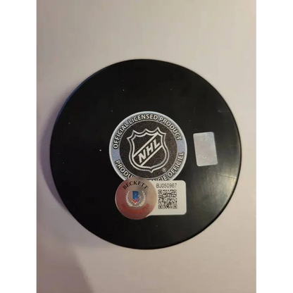 Autographed hockey puck with NHL and Beckett stickers from Joseph Blandisi New Jersey Devils
