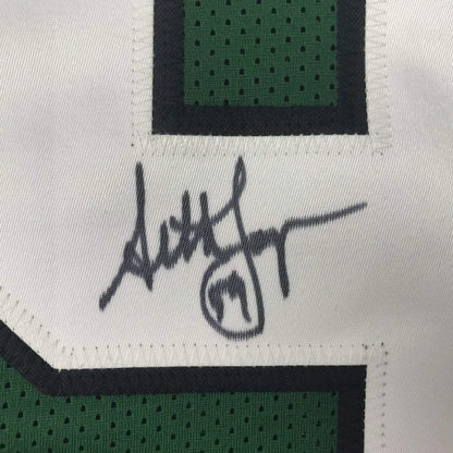 Autographed green and white custom jersey from Joyner 59 for football fans