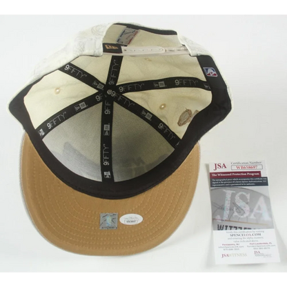 Underside of Jrue Holiday Signed Celtics Championship Adjustable Hat with authenticity stickers