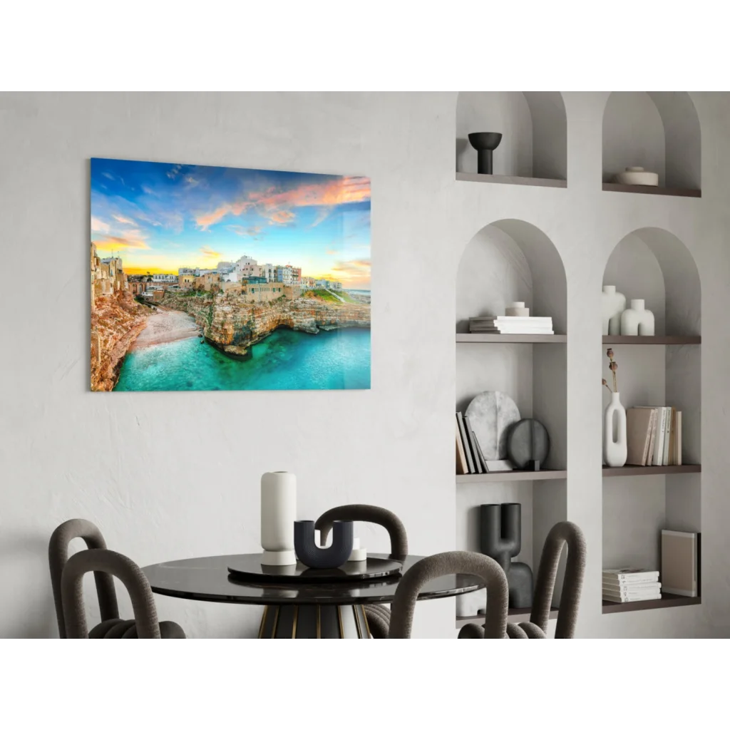 Vibrant coastal town glass wall art with turquoise waters and sunset cliffs