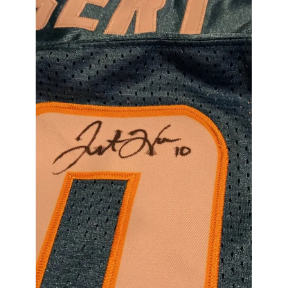 Teal Justin Herbert autographed jersey with number 10 and signature, perfect for fans