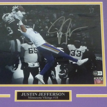 Framed Justin Jefferson autographed Minnesota Vikings spotlight catch photo