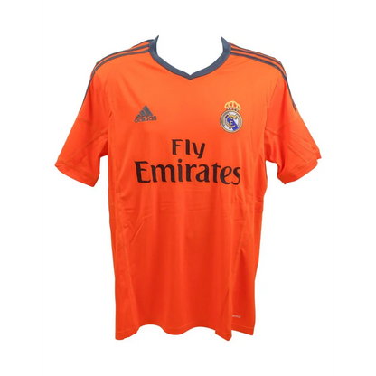 Orange Real Madrid jersey with black trim, signed by Karim Benzema, collectible item