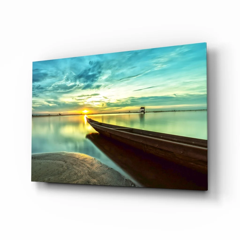 Serene sunset glass wall art canvas print with teal gold sky and boat