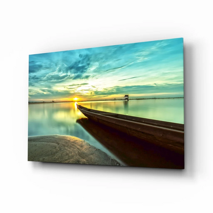 Serene sunset glass wall art canvas print with teal gold sky and boat