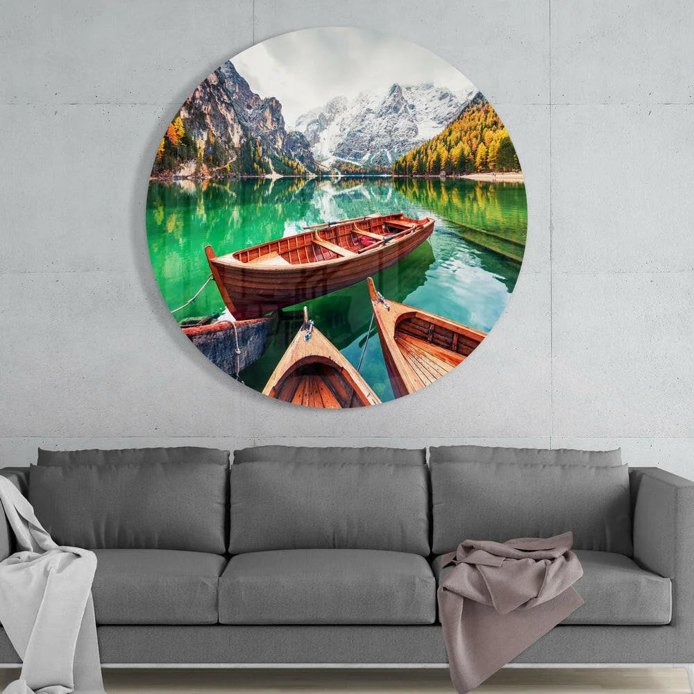 Vibrant turquoise lake glass art on tempered glass, with rowboats and snowy mountains