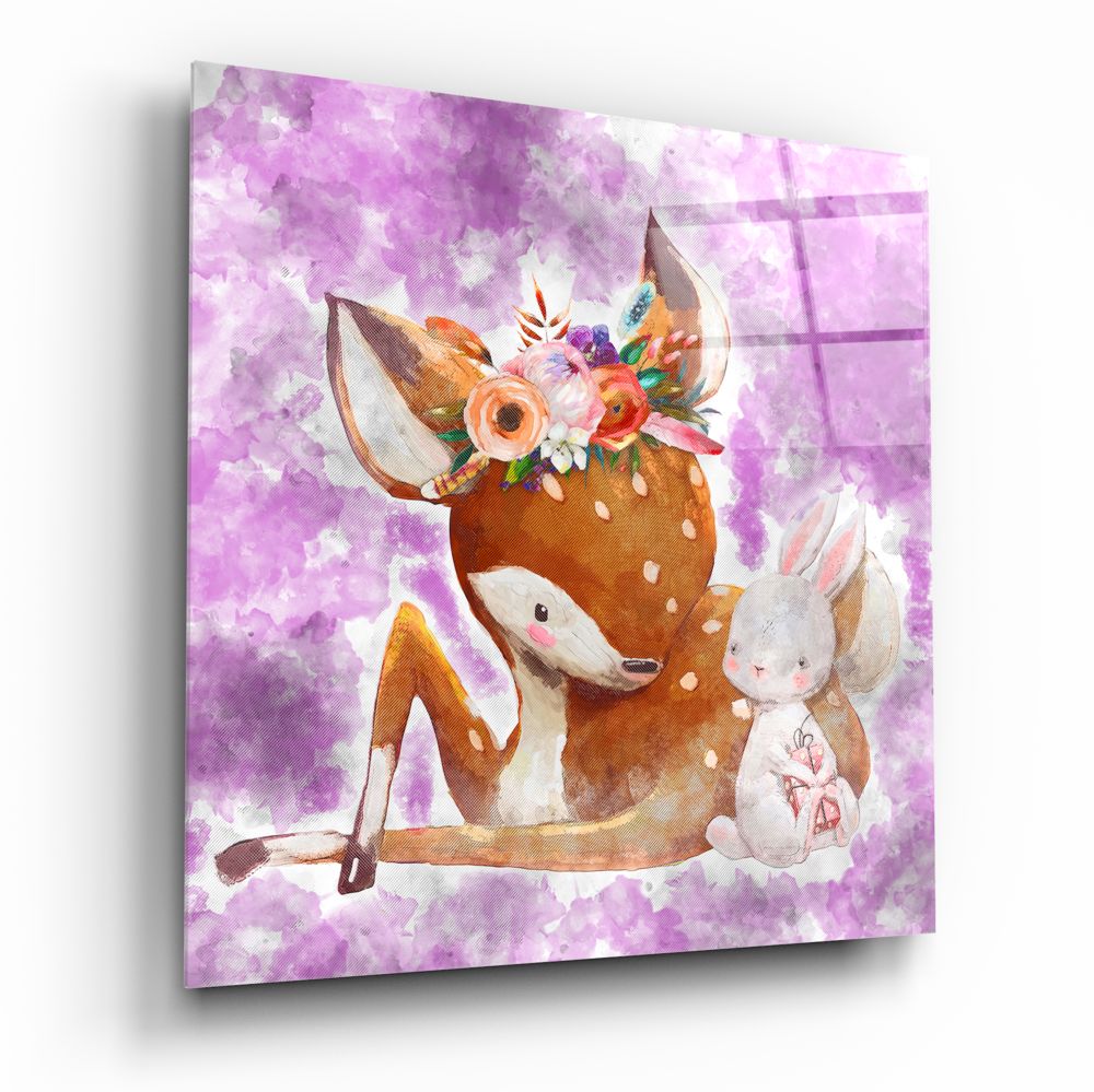 Glass wall art panel displaying a brown gazelle wearing a colorful flower crown with a white rabbit beside it against a purple watercolor background.