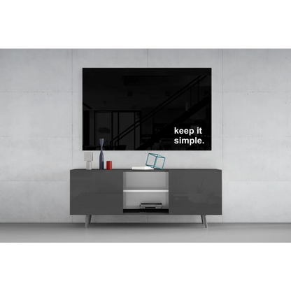 Black minimalist TV screen wall art with Keep it simple text on glass