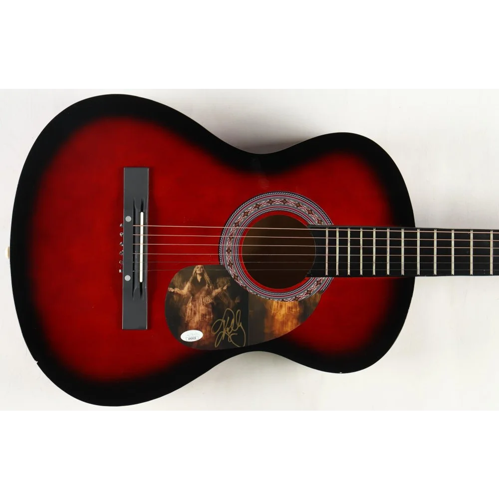 Kelly Clarkson signed acoustic guitar with red and black finish and custom pickguard