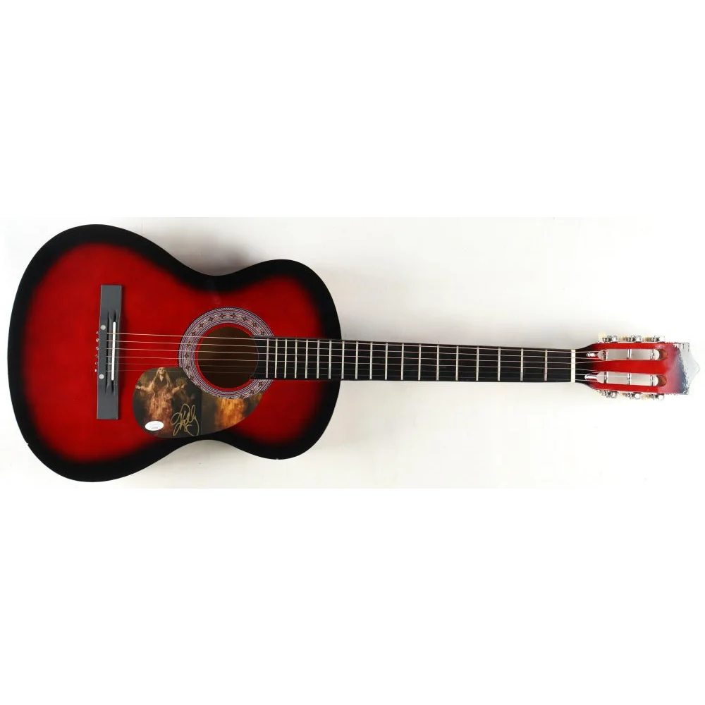 Kelly Clarkson signed acoustic guitar with red and black finish and decorative pickguard