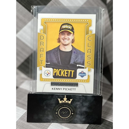 Kenny Pickett gold football card in case from Prestige Worldwide Collectibles