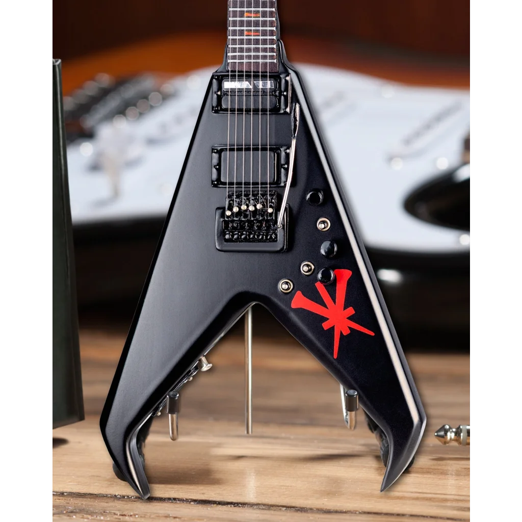 Black Jackson V guitar with red flames on Axe Heaven stand