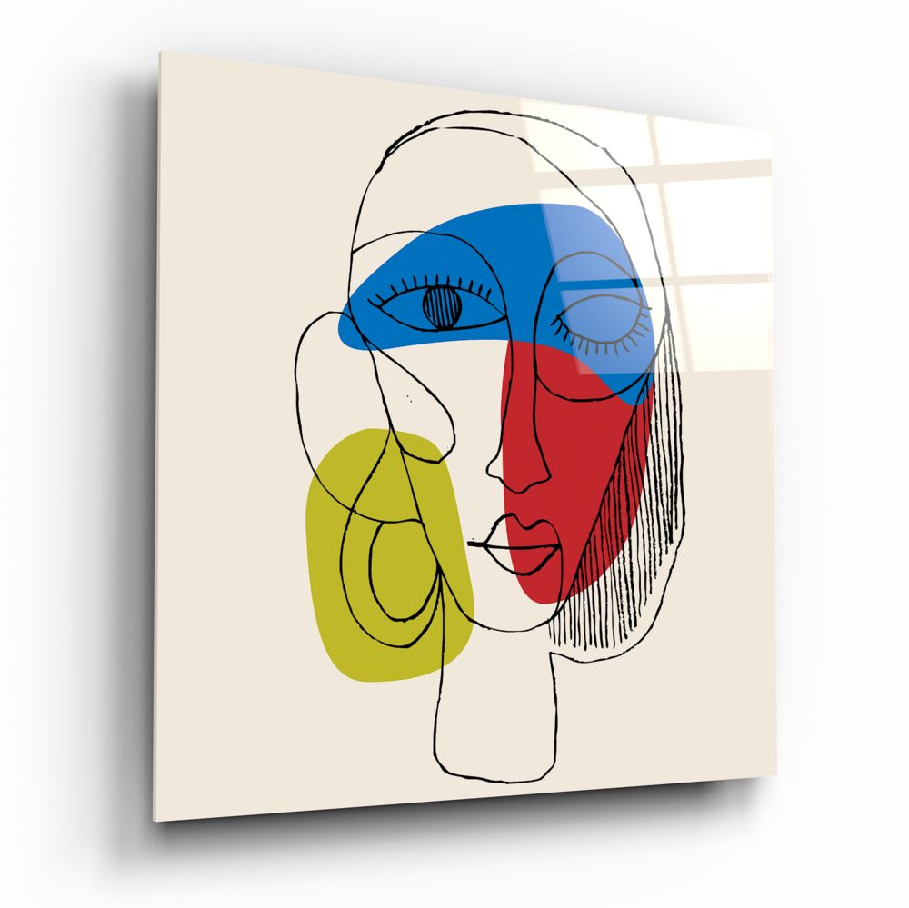 Modern abstract lineart face glass wall art with blue, red, and yellow geometric color blocks on cream background, displayed at angle.
