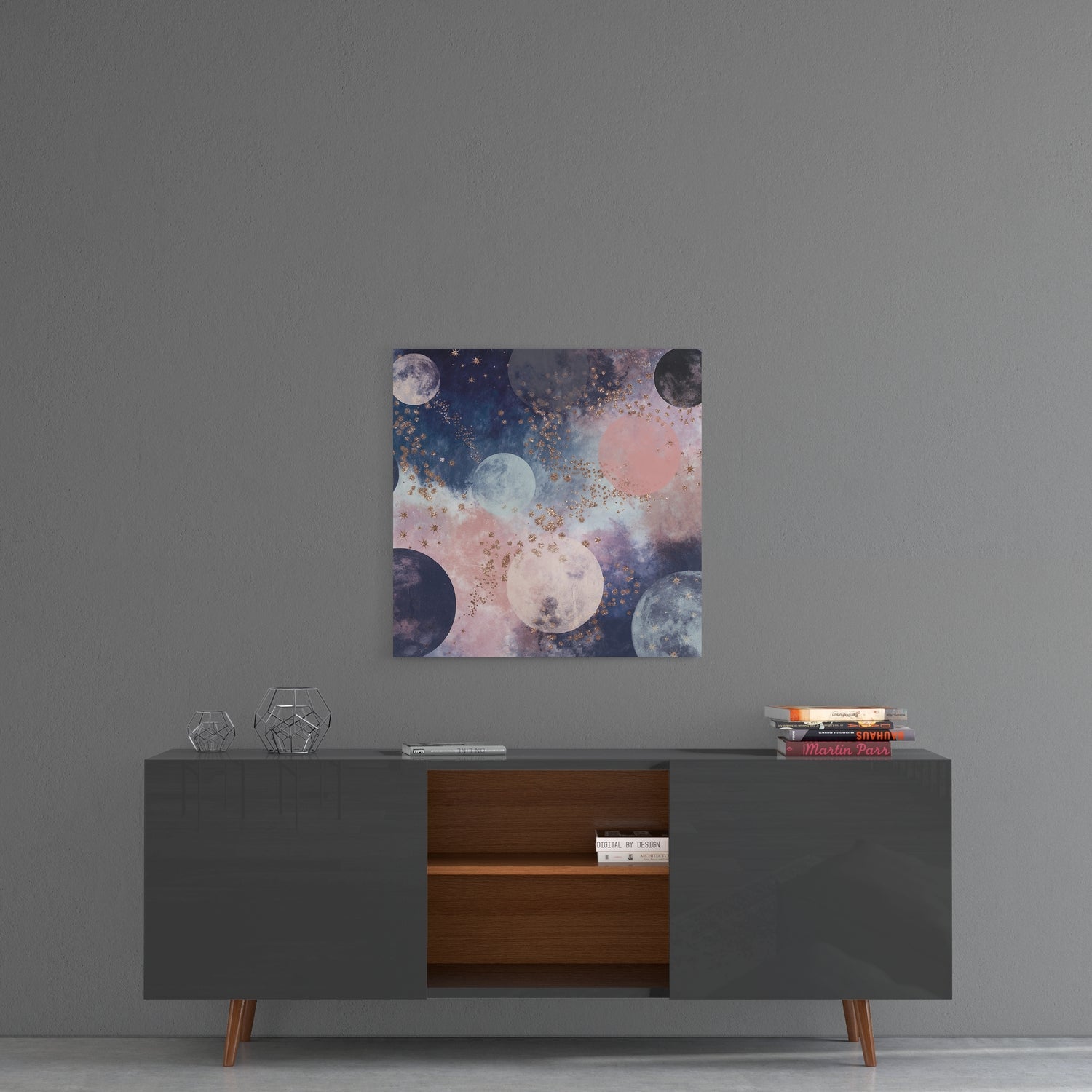 Dreamy Space Glass Wall Art displaying moons and celestial bodies in pink, blue, and gold tones, hung above a mid-century modern console table.