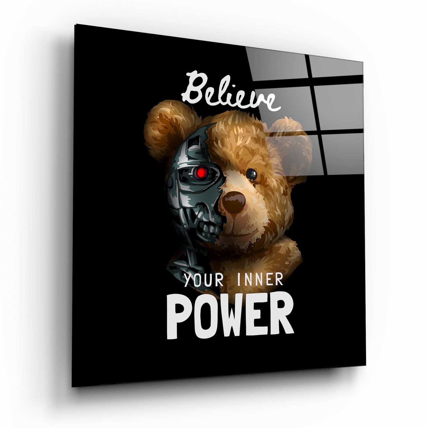 Glass wall art displaying a brown and white bear with a metallic robotic half-face and red eye against black background with "Believe Your Inner Power" text.