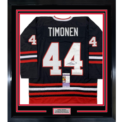 Black Chicago Blackhawks jersey number 44 with "TIMONEN" nameplate, signed, displayed in red-bordered frame with authentication certificate.