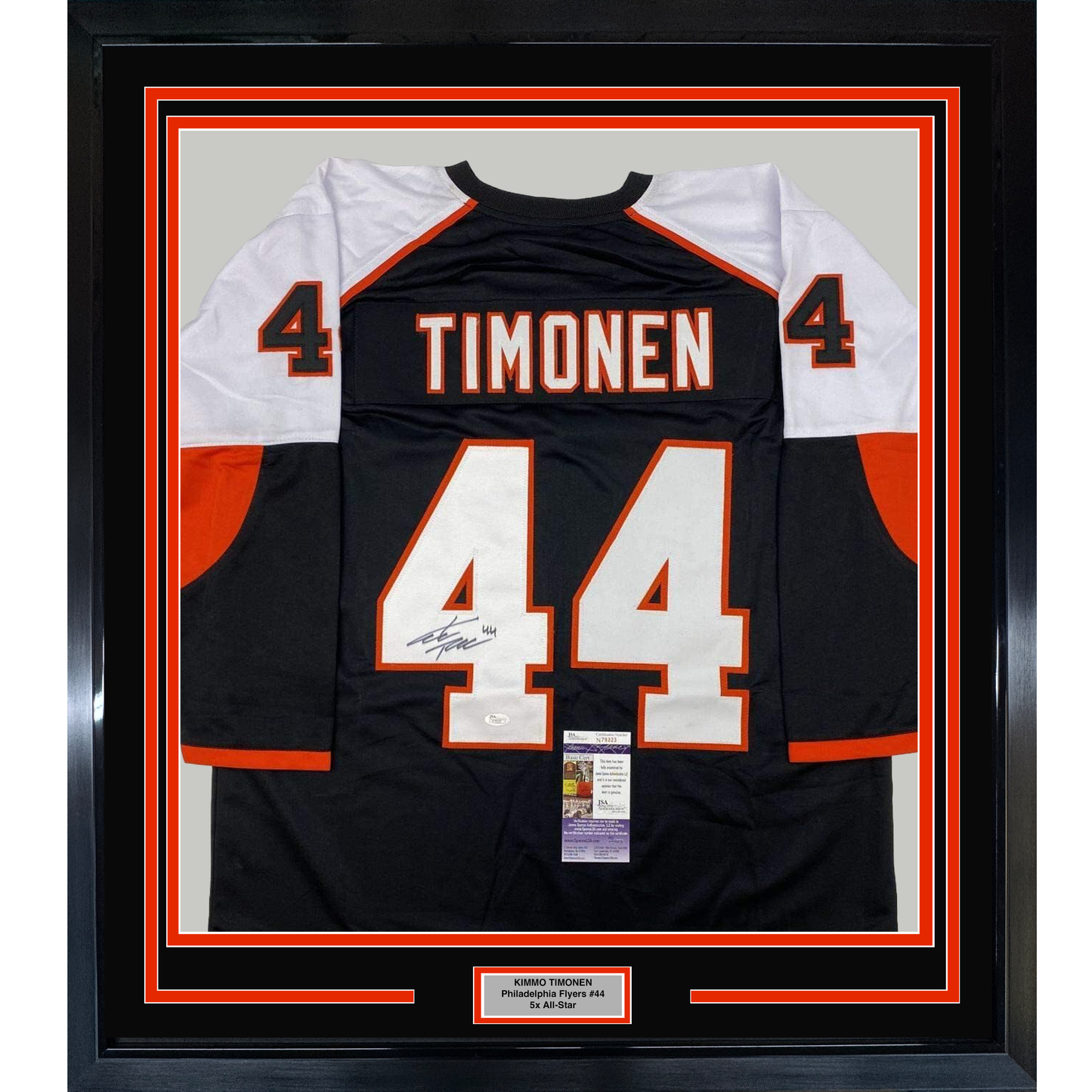 Framed black Philadelphia Flyers jersey number 44 with "TIMONEN" nameplate, signed, displayed flat against white and orange matting with JSA authentication certificate visible at center bottom.